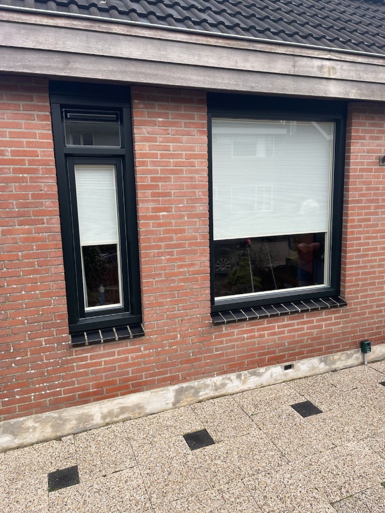 Bestaande kozijnen in een gevel